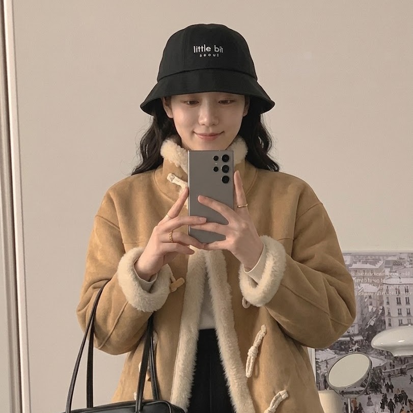 little bit seoul bucket hat, worn — Instagram post