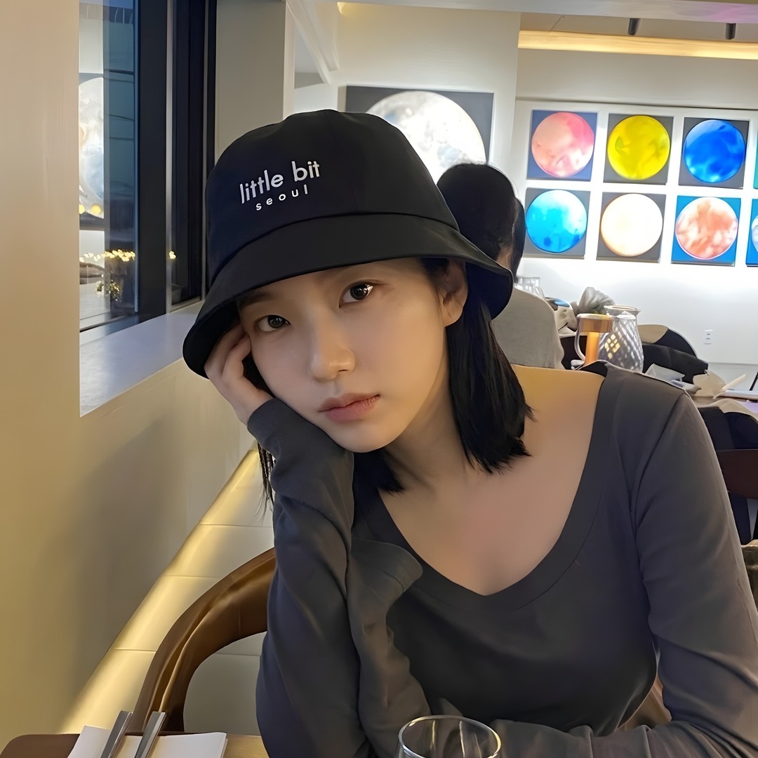 little bit seoul bucket hat, worn — Instagram post