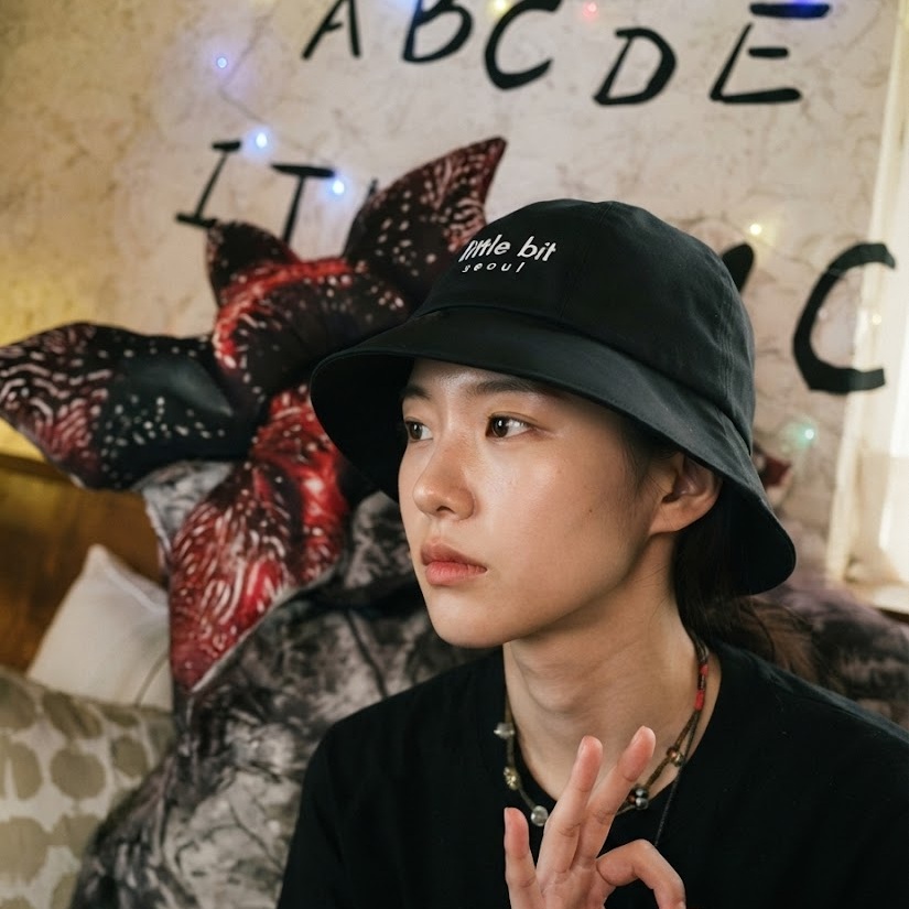 little bit seoul bucket hat, worn — Instagram post