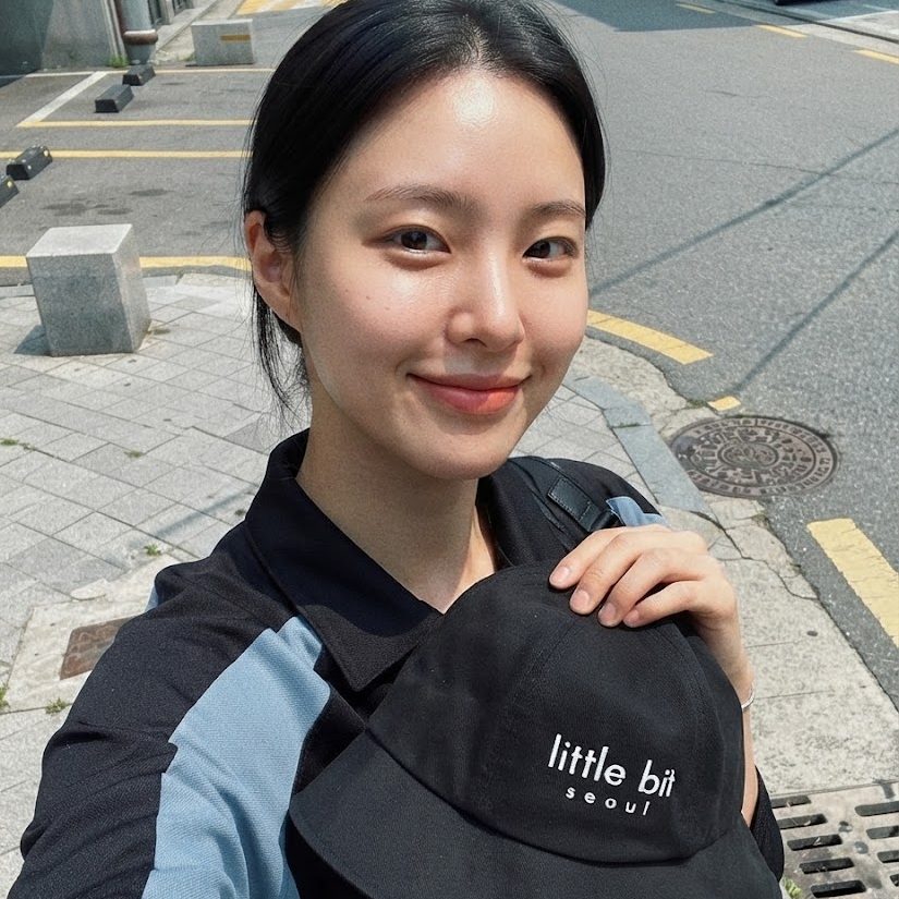 little bit seoul bucket hat, worn — Instagram post