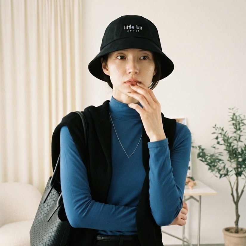 little bit seoul bucket hat, worn — Instagram post