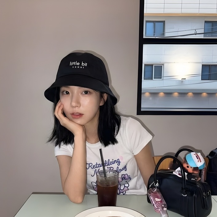 little bit seoul bucket hat, worn — Instagram post