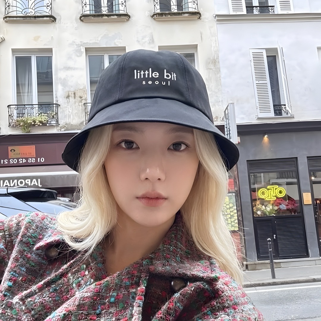 little bit seoul bucket hat, worn — Instagram post