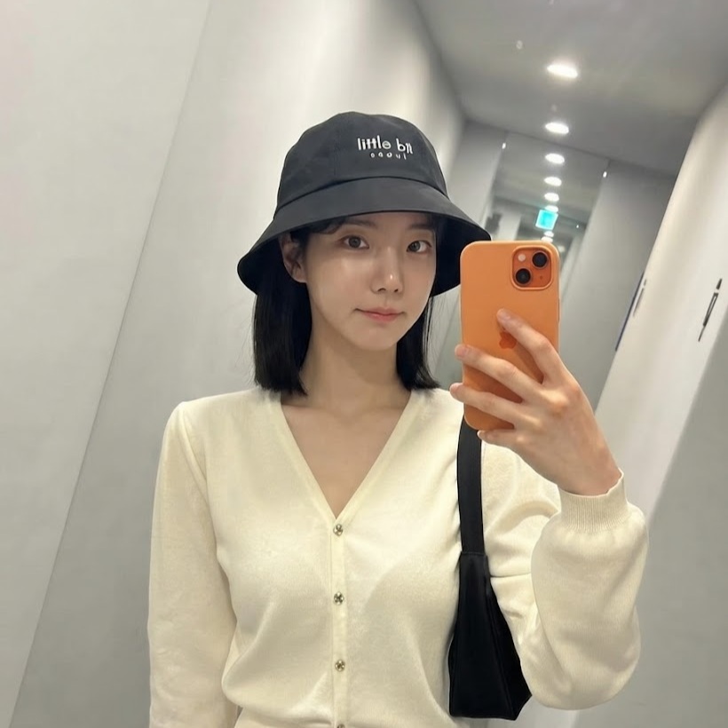 little bit seoul bucket hat, worn — Instagram post