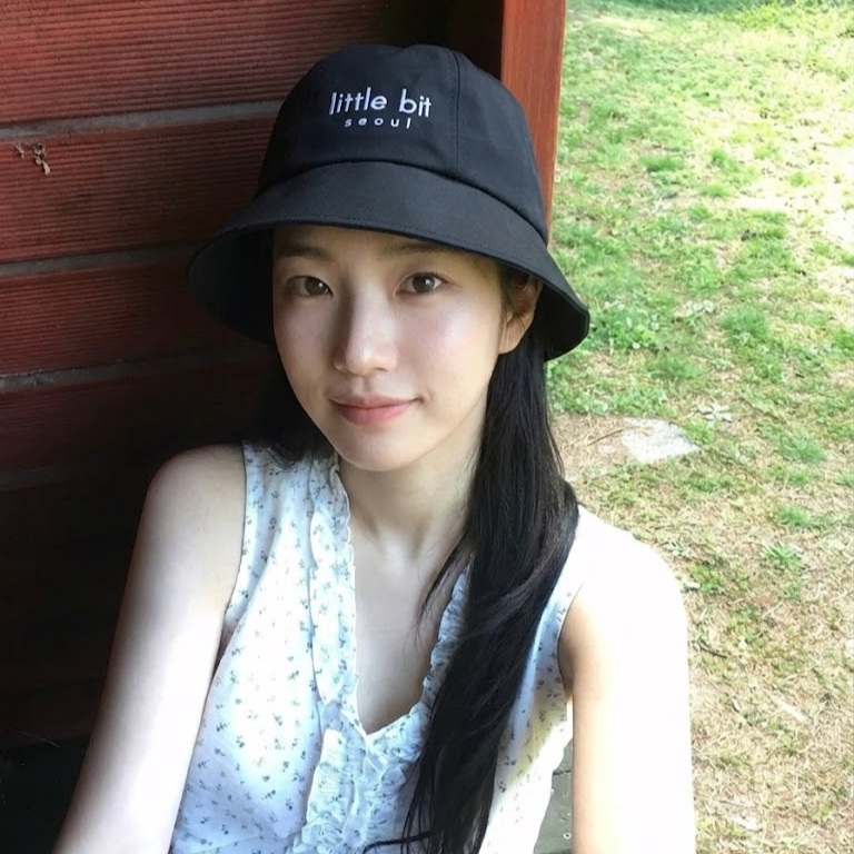 little bit seoul bucket hat, worn — Instagram post