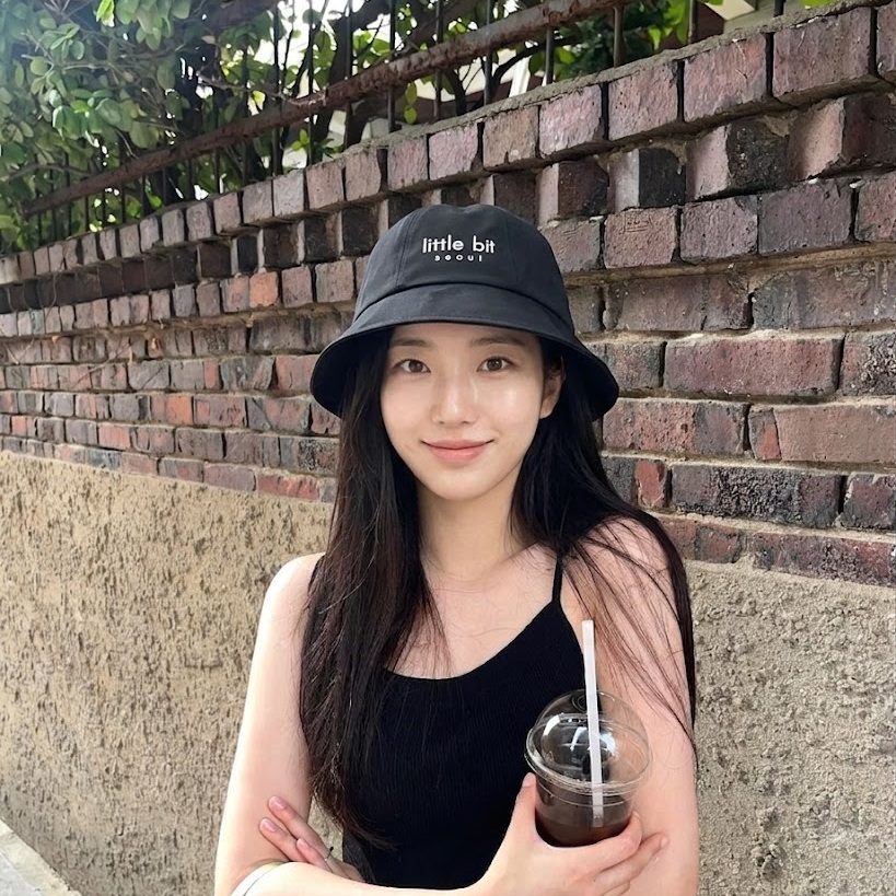 little bit seoul bucket hat, worn — Instagram post
