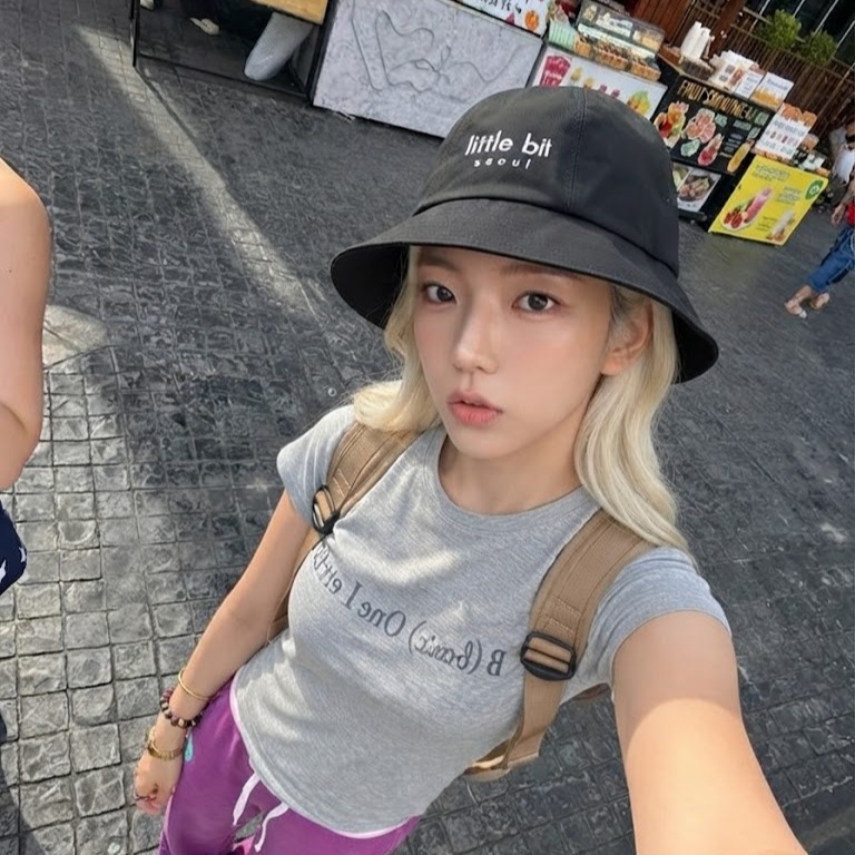 little bit seoul bucket hat, worn — Instagram post
