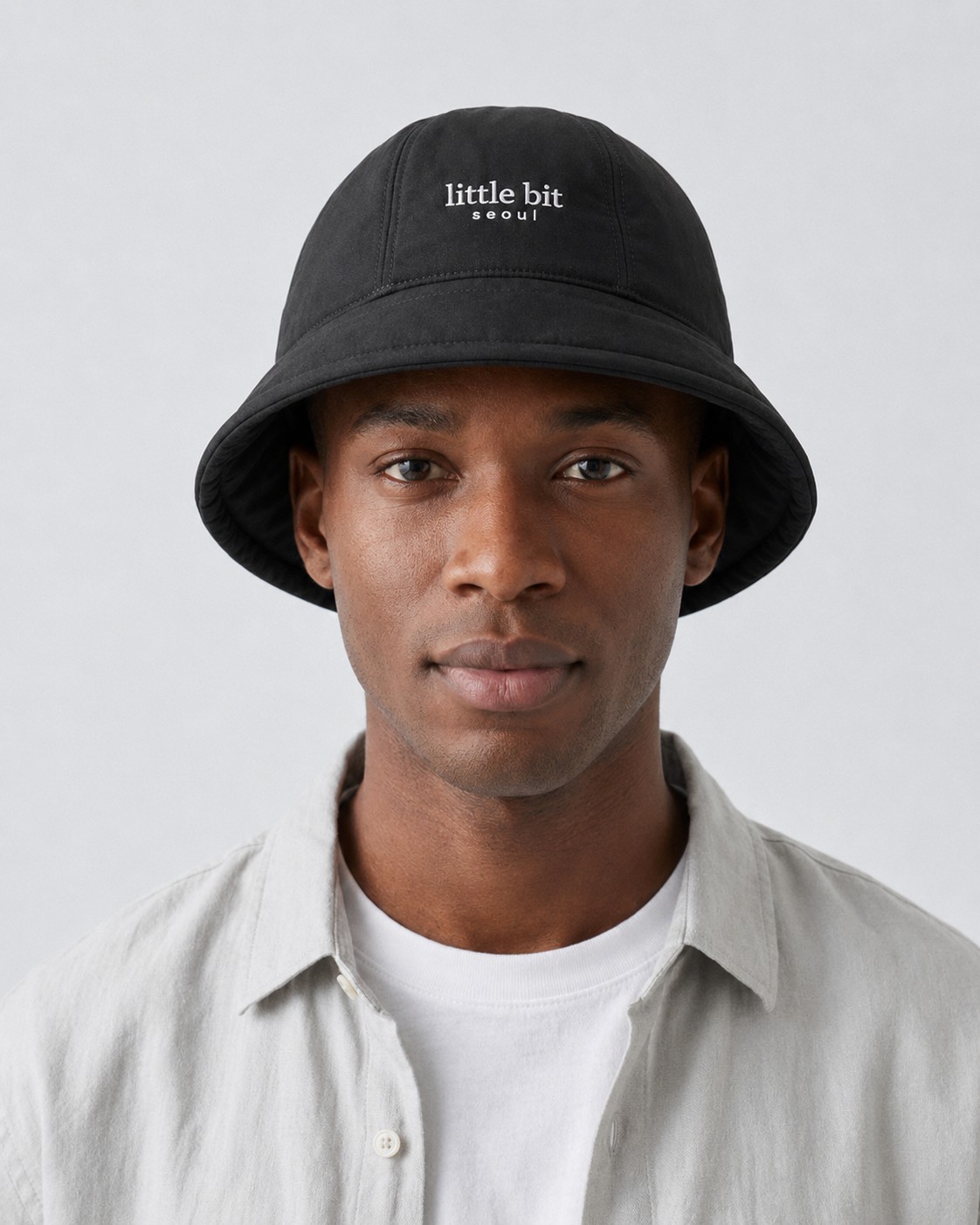little bit seoul bucket hat on model, front